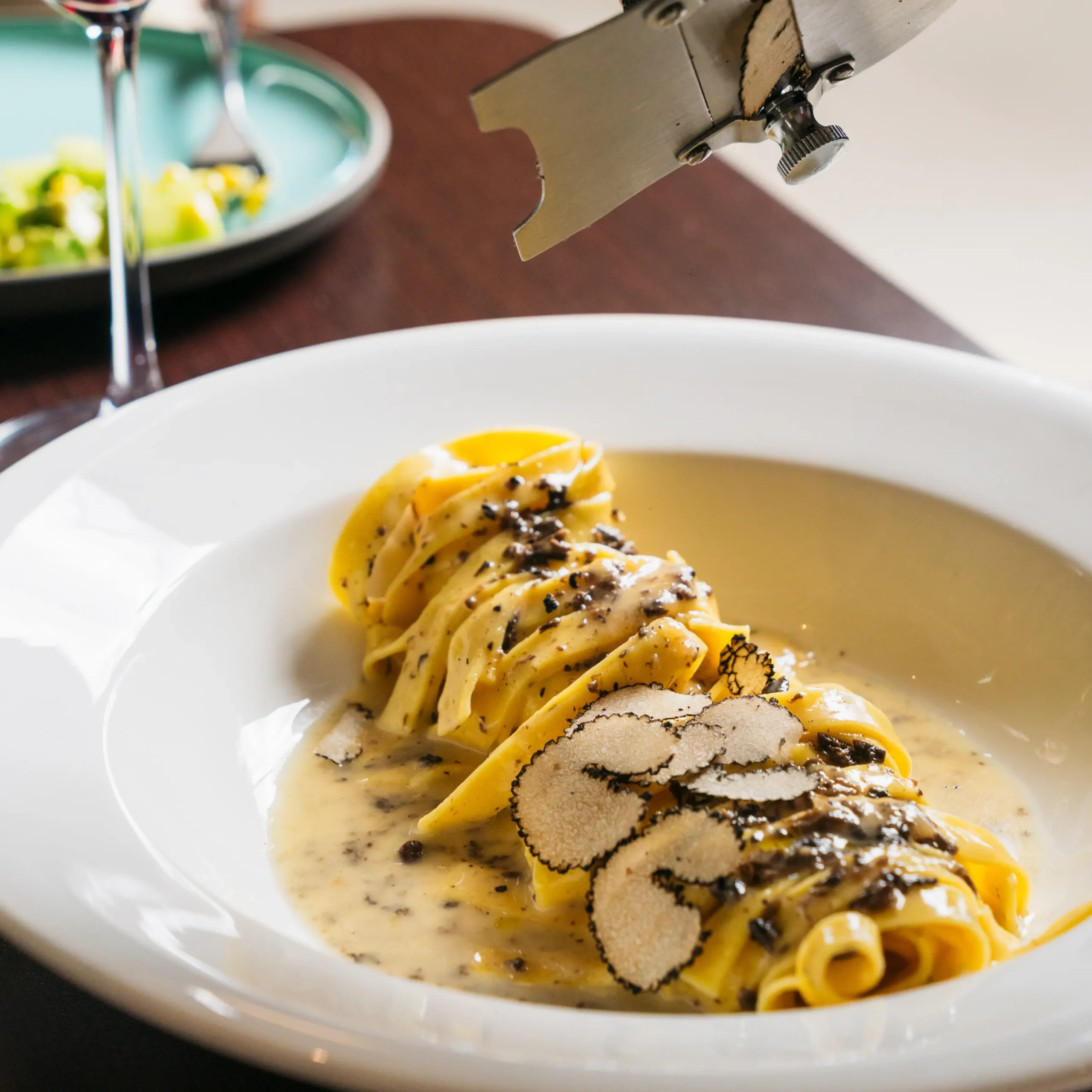 Spicy chicken Alfredo pasta served hot on a plate